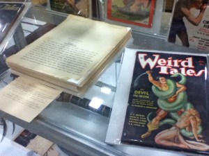 Original Robert E. Howard manuscript and vintage issue of Weird Tales with R.E.H. cover story.